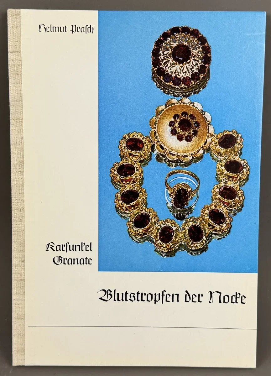 Helmut Prasch, "Karfunkel Granate - Blutstropfen der Nocke"  Granatschmuck und dessen Geschichte im Kärntner Raum. im Fachhandel um 129 € 