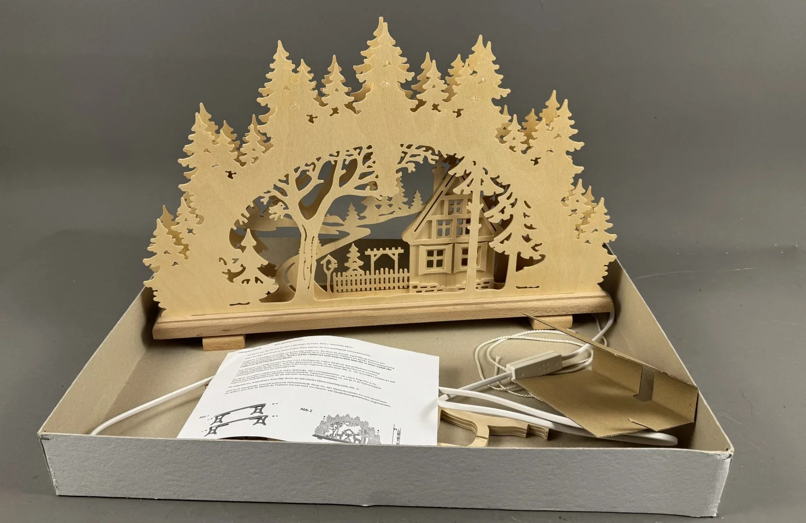 Drehvo 3D-Lichterbogen Holzschnitzerei Waldhaus